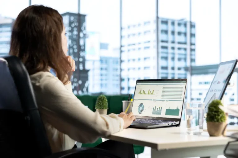 Short Term Rental Management Professional Analyzing Revenue Dashboard