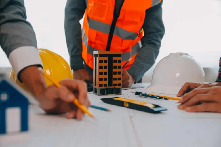 Facilities management consultant discussing facility operations